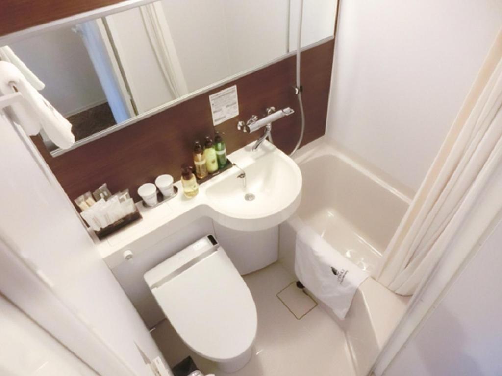 Koupelna v ubytování Natural Hot Spring Hotel Livemax Premium Hiroshima