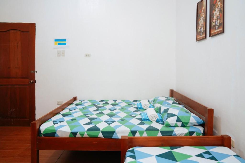Postel nebo postele na pokoji v ubytování C Star Travellers Inn