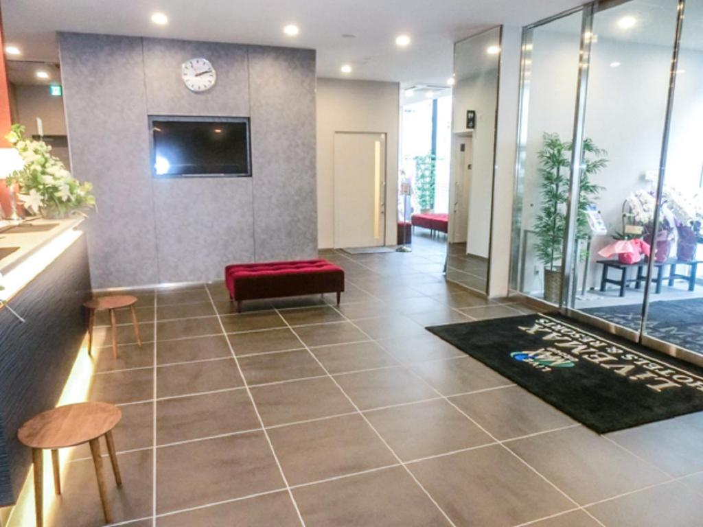 TV a/nebo společenská místnost v ubytování Natural Hot Spring Hotel Livemax Premium Hiroshima