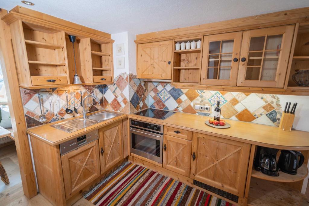 Kuchyň nebo kuchyňský kout v ubytování Gästehaus Leirerhäusl