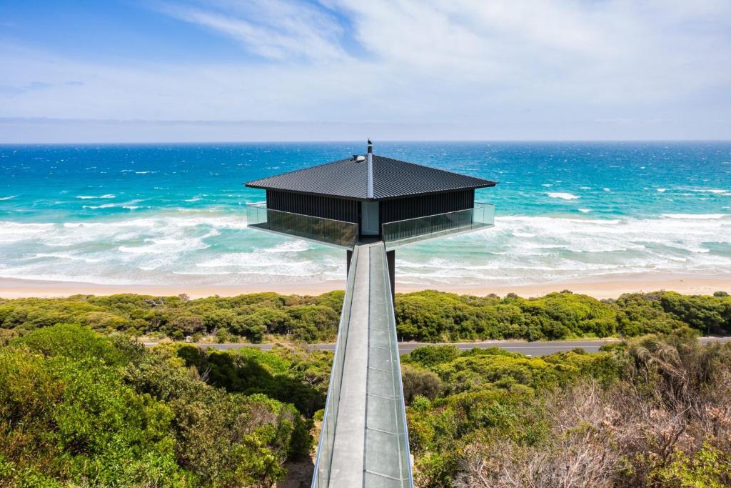 a observation tower at the beach near the ocean at The Pole House in Aireys Inlet