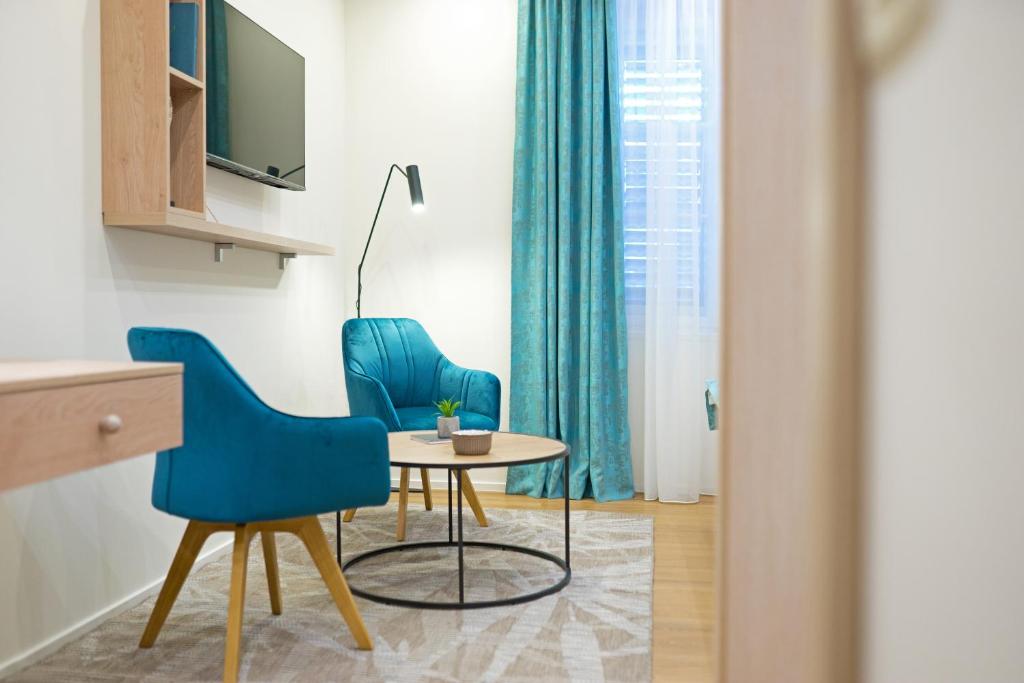 TV a/nebo společenská místnost v ubytování Luxury rooms MARIOTY