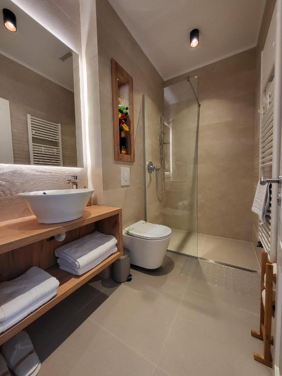 Koupelna v ubytování Hotel Excellence