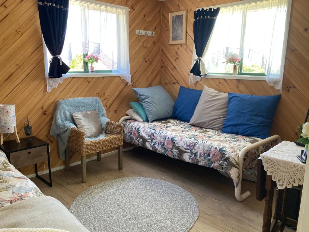 Postel nebo postele na pokoji v ubytování Winganah Cottage