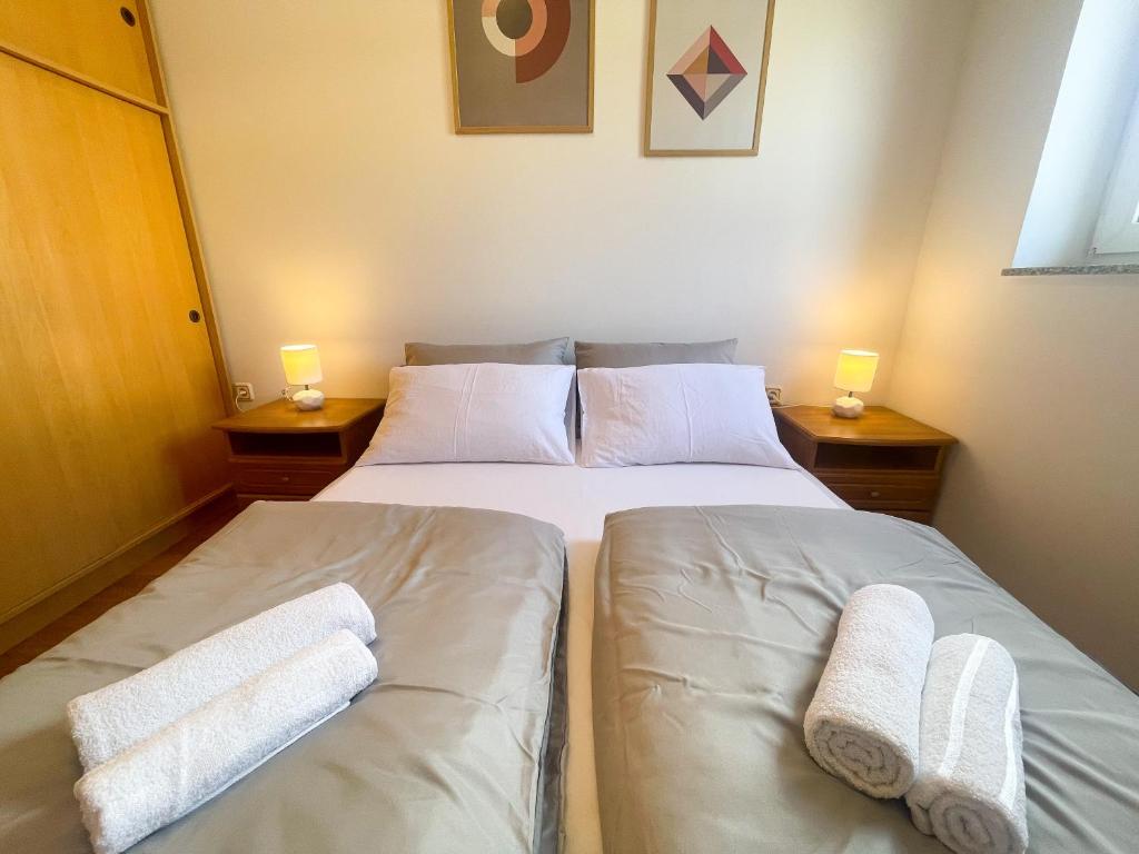 Posteľ alebo postele v izbe v ubytovaní Apartman La Mar