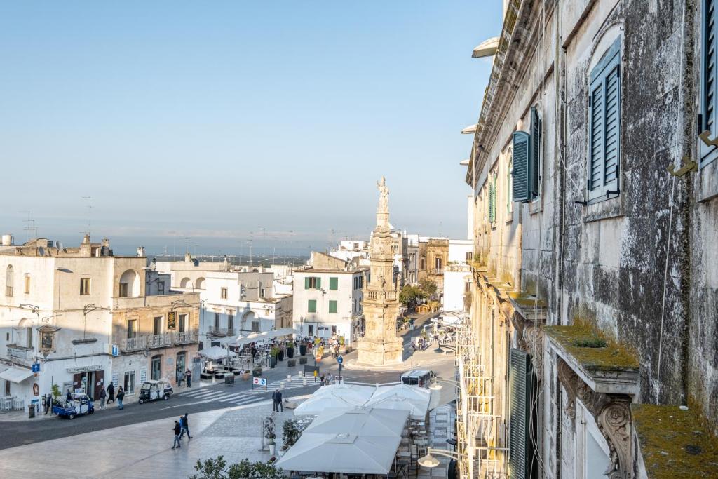 a view of a city street from a building at GuestHost - Guest House La Baronessa in Ostuni