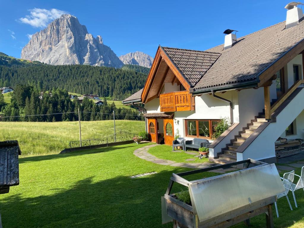 a house with a view of a mountain at Chalet Romy AP 3 in Pramauron