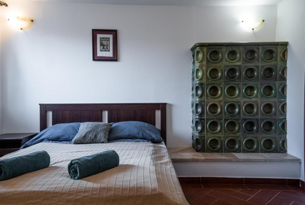 Postel nebo postele na pokoji v ubytování Holló Vendégház