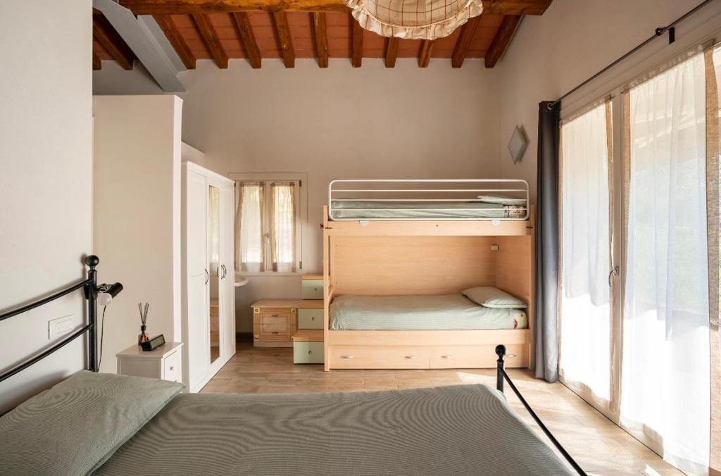 Posteľ alebo postele v izbe v ubytovaní Cozy Tuscany apartment with view