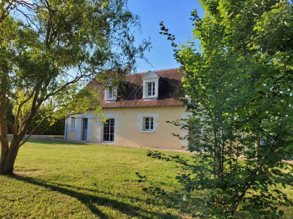 an exterior view of the house from the yard at La Prée in Angé