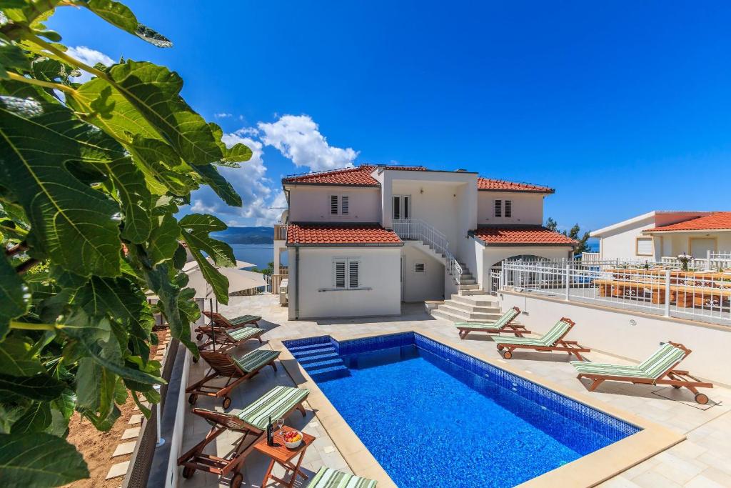 an image of a villa with a swimming pool at Villa Katarina in Stanići