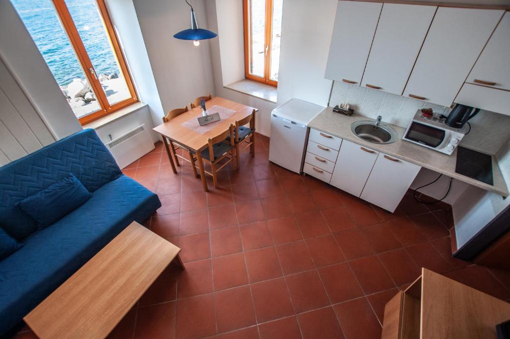 Kuchyň nebo kuchyňský kout v ubytování Apartments Punta Piran