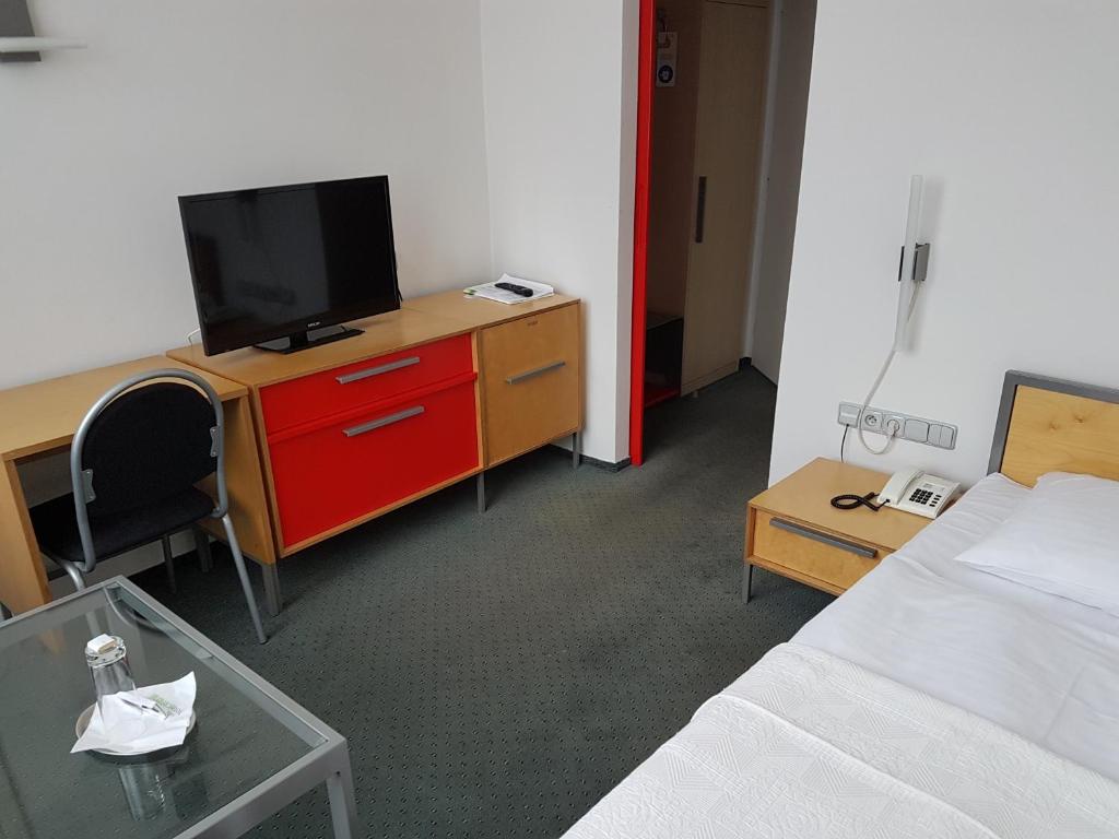 TV a/nebo společenská místnost v ubytování Hotel Central