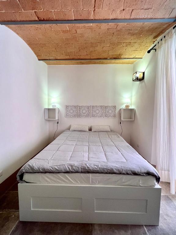 Postel nebo postele na pokoji v ubytování Guest house Le due lagune