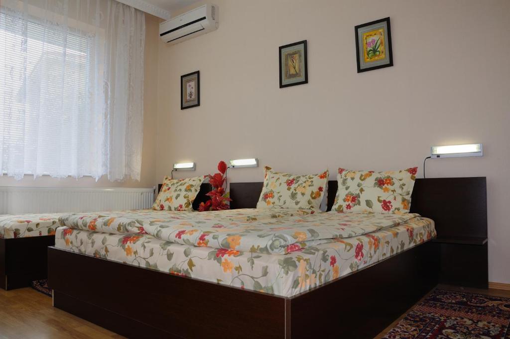 Postel nebo postele na pokoji v ubytování Sakutski House