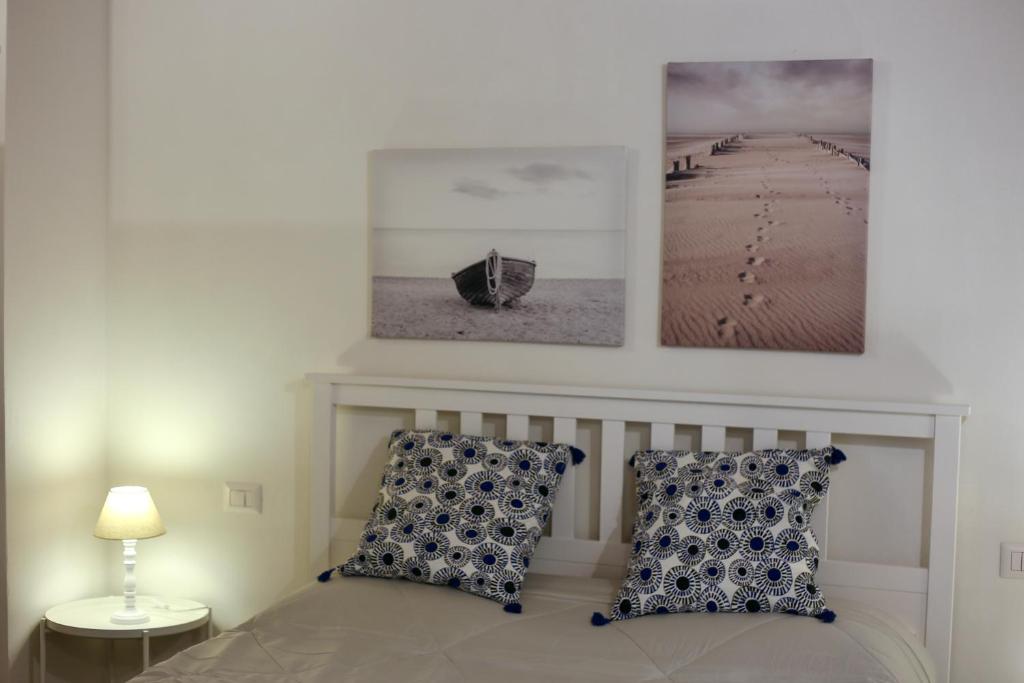 Postel nebo postele na pokoji v ubytování Guest house Le due lagune
