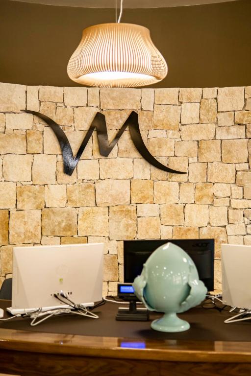 TV a/nebo společenská místnost v ubytování Mercure Hotel President Lecce
