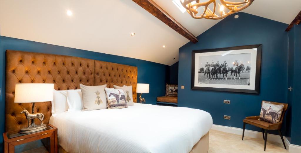 The Hotel Chester tesisinde bir odada yatak veya yataklar