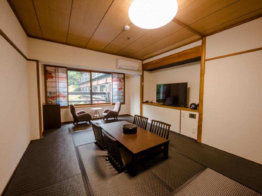 TV a/nebo společenská místnost v ubytování LiVEMAX RESORT Aki Miyajima
