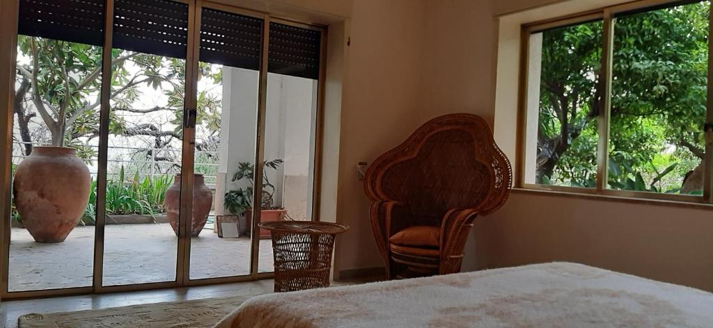 Posteľ alebo postele v izbe v ubytovaní Colazione in giardino con vista mare
