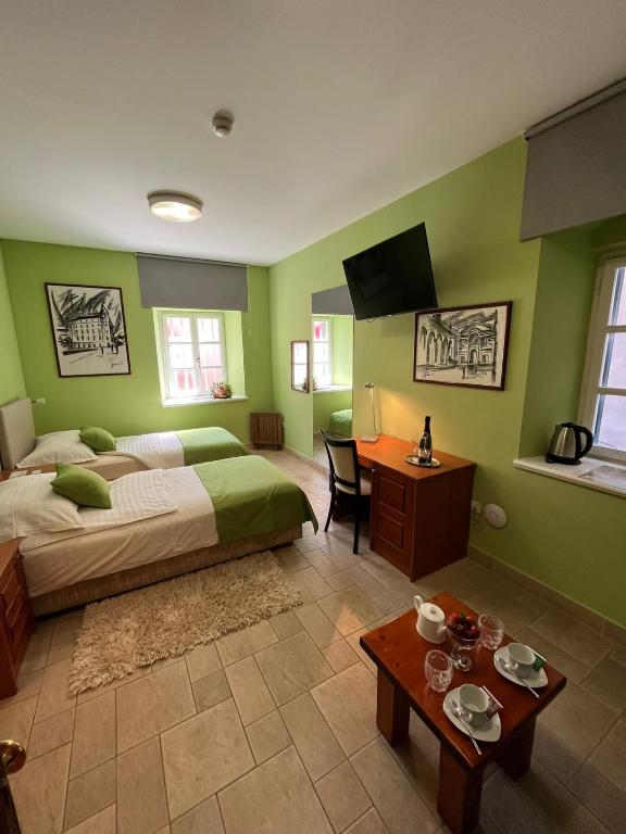 Posteľ alebo postele v izbe v ubytovaní Rooms Toni Palace