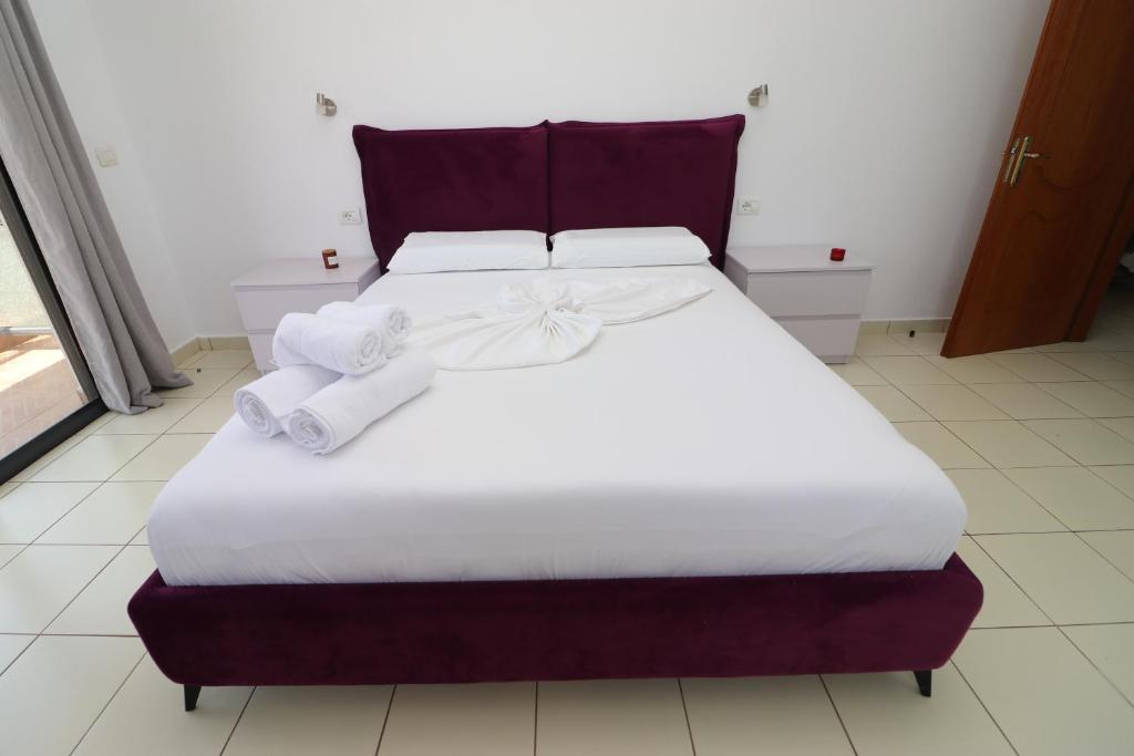 Postel nebo postele na pokoji v ubytování Bora Rooms