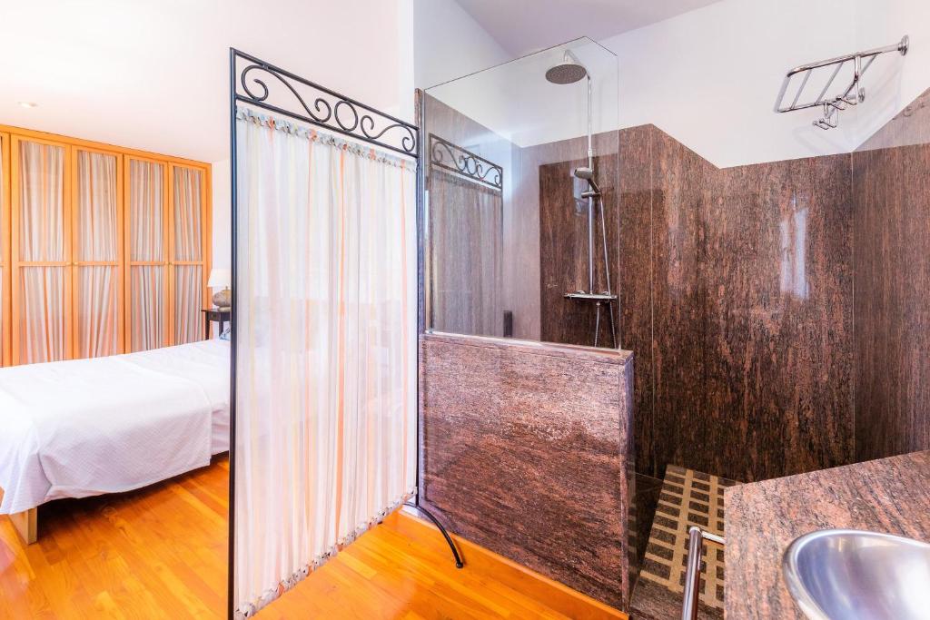 Postel nebo postele na pokoji v ubytování Villa Rico