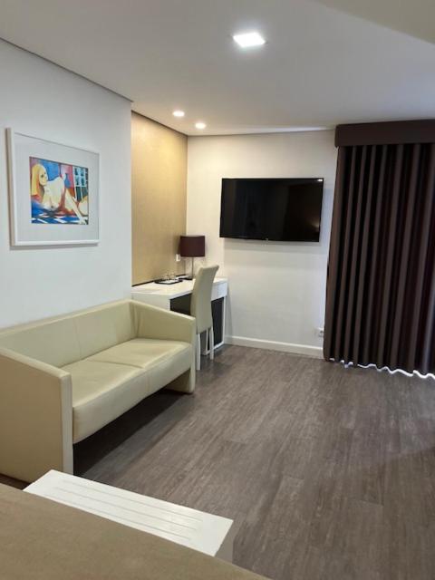TV a/nebo společenská místnost v ubytování Seculo Hotel