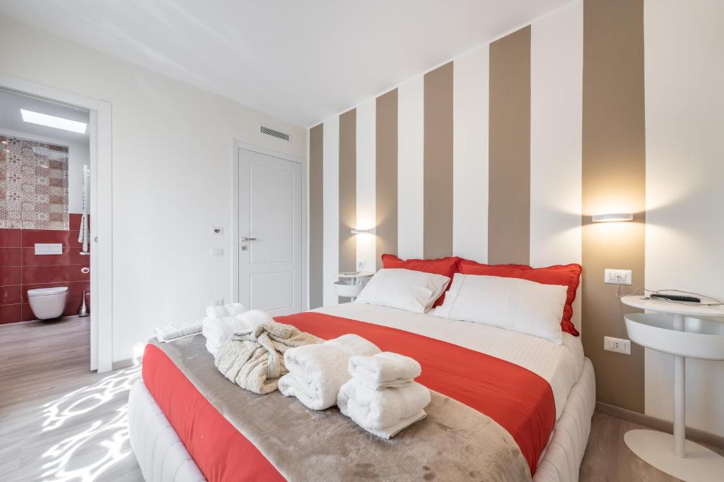 A bed or beds in a room at Le residenze di Carlà - Stampace