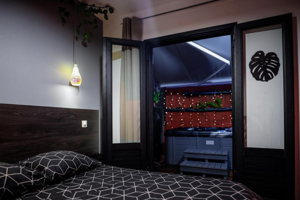 Postel nebo postele na pokoji v ubytování JASMIN DE NUIT - Villa FOURNAISE
