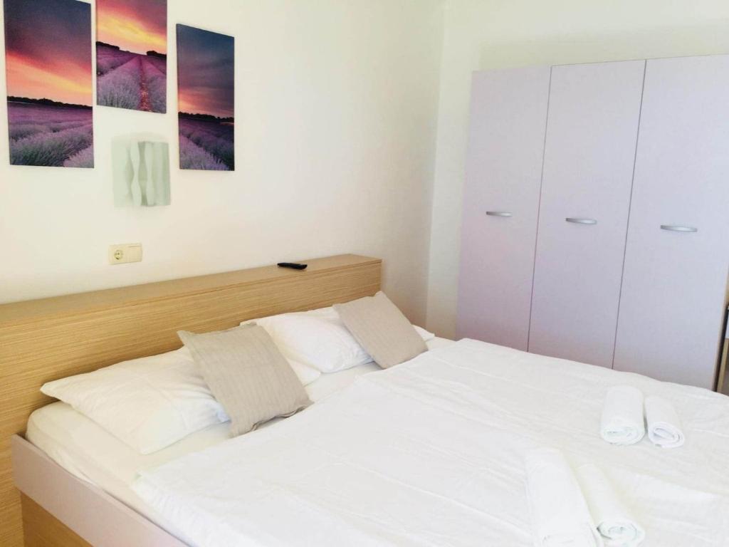 Postel nebo postele na pokoji v ubytování Meduza B&b