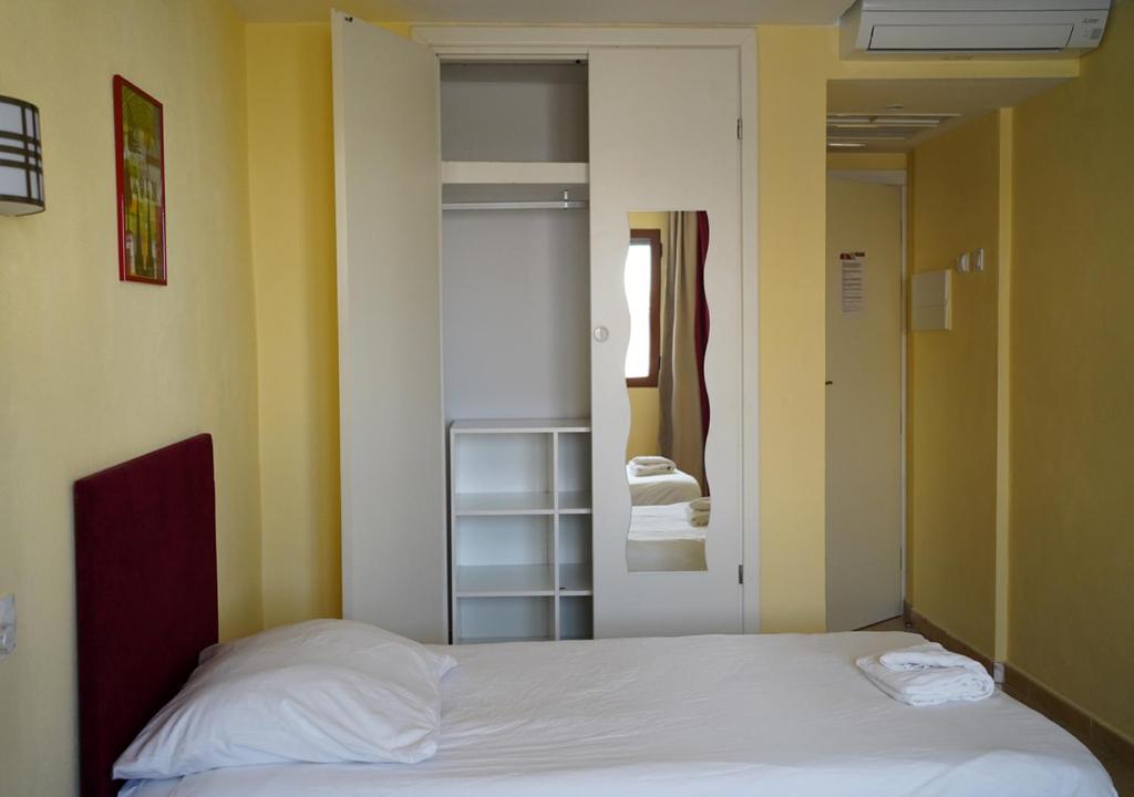Posteľ alebo postele v izbe v ubytovaní Das Hostal