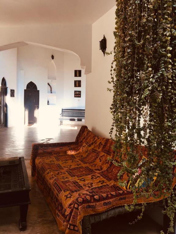 Postel nebo postele na pokoji v ubytování Casa Umoja