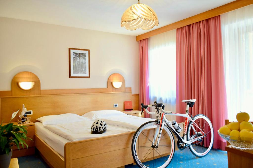 Postel nebo postele na pokoji v ubytování Hotel Waldheim