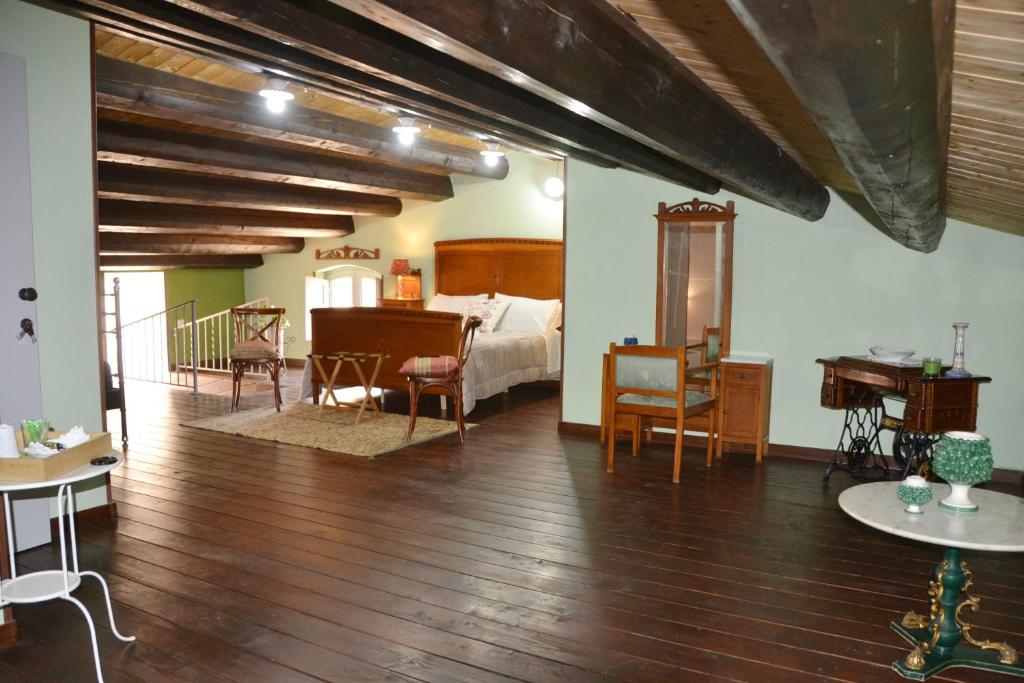 Postel nebo postele na pokoji v ubytování SUD room Palazzo Rau della Ferla