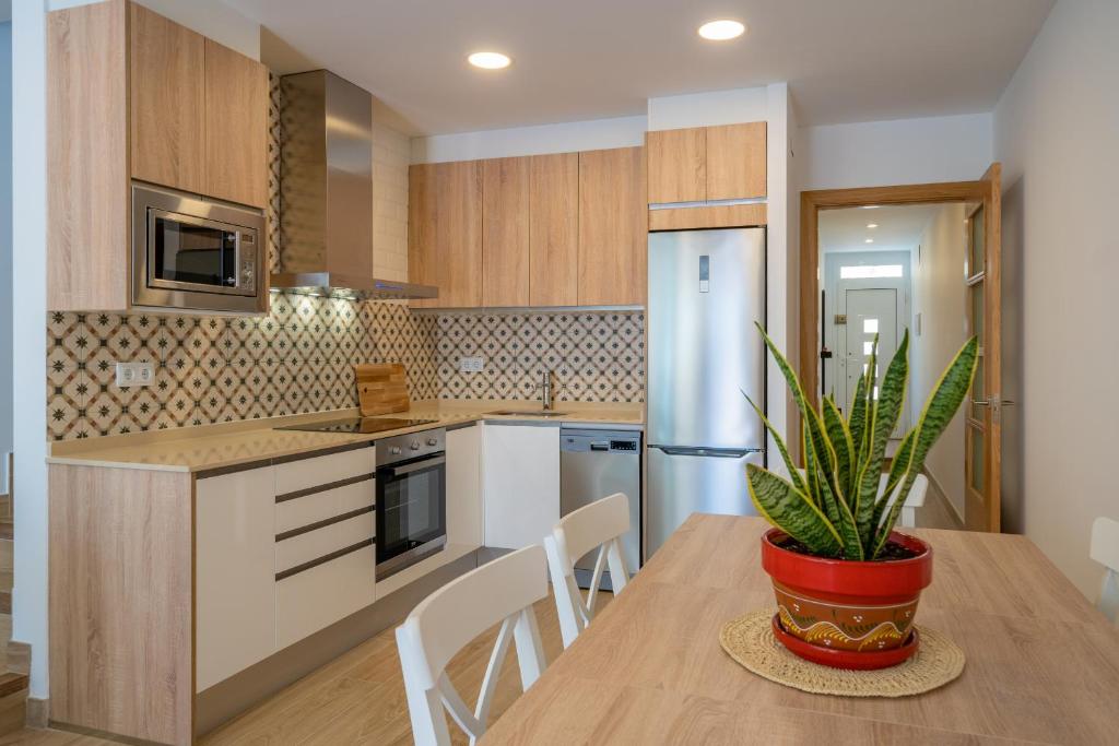 Kuchyňa alebo kuchynka v ubytovaní HomeHolidaysRentals Benoit - Costa Barcelona