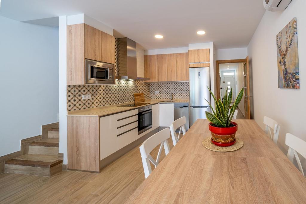 Kuchyňa alebo kuchynka v ubytovaní HomeHolidaysRentals Benoit - Costa Barcelona