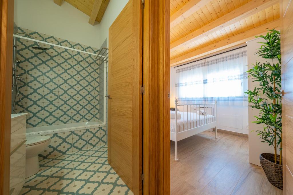 Posteľ alebo postele v izbe v ubytovaní HomeHolidaysRentals Benoit - Costa Barcelona