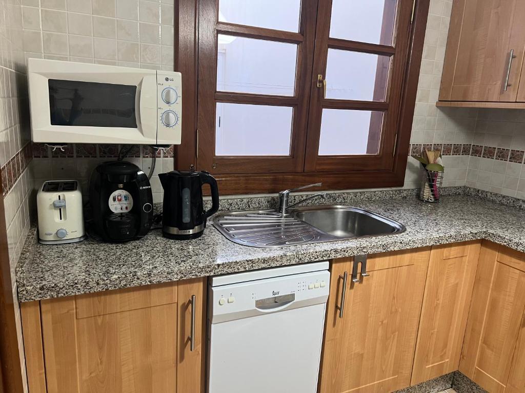 Kuchyň nebo kuchyňský kout v ubytování CasadeLanzarote