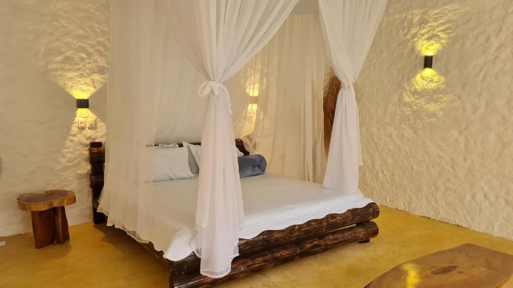 Postel nebo postele na pokoji v ubytování Posada Turistica Dantayaco
