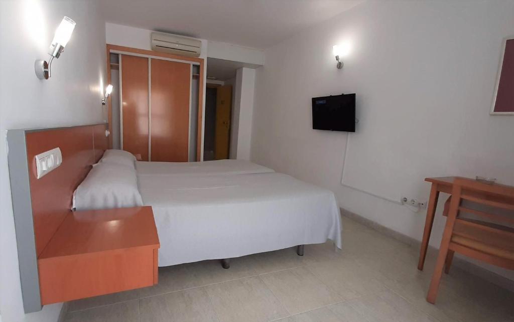 Posteľ alebo postele v izbe v ubytovaní Hotel Mirablau