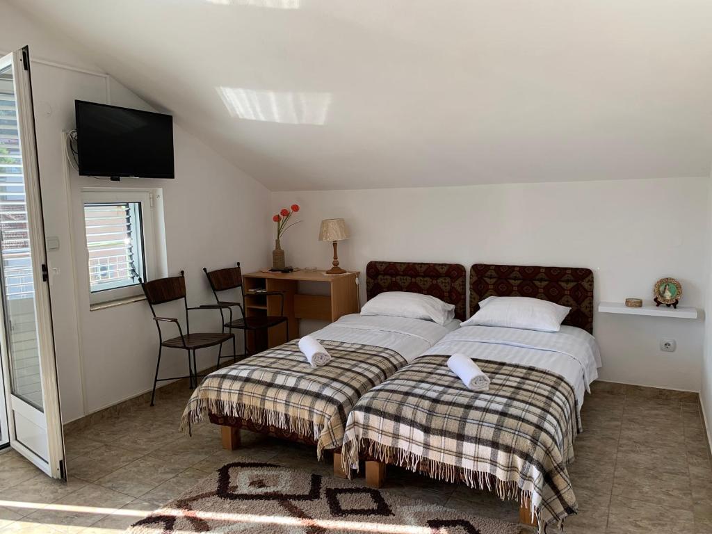 Letto o letti in una camera di Zvezda Meljine