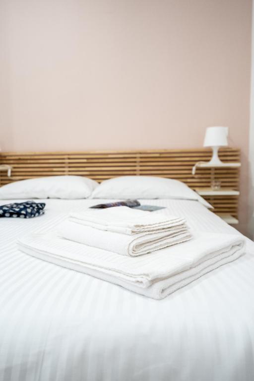 Posteľ alebo postele v izbe v ubytovaní Via Venezia 32 Room