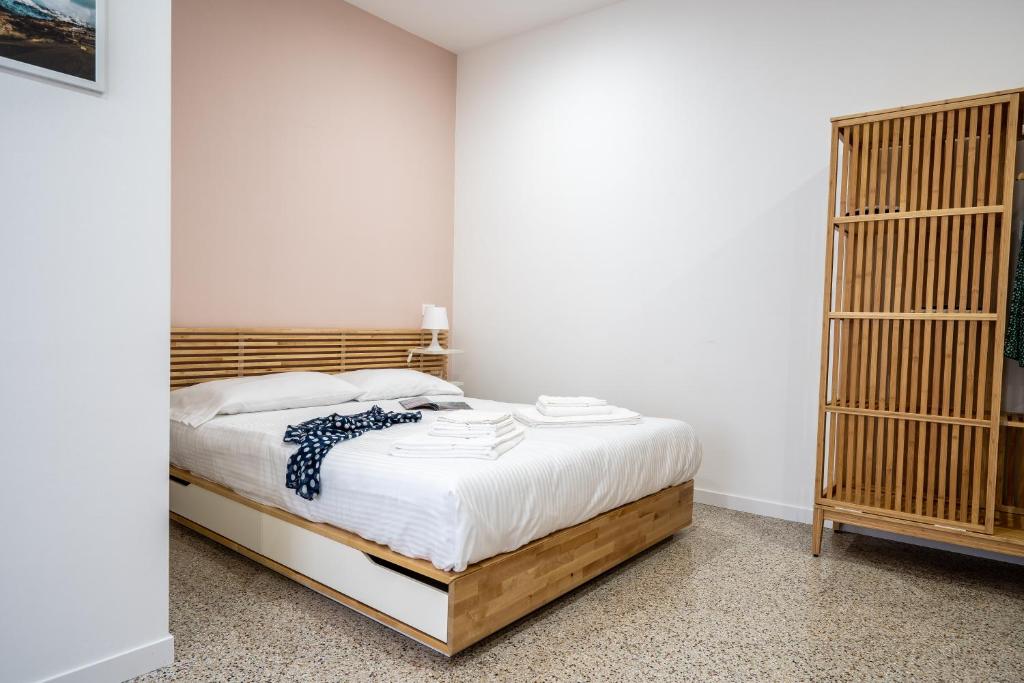 Posteľ alebo postele v izbe v ubytovaní Via Venezia 32 Room