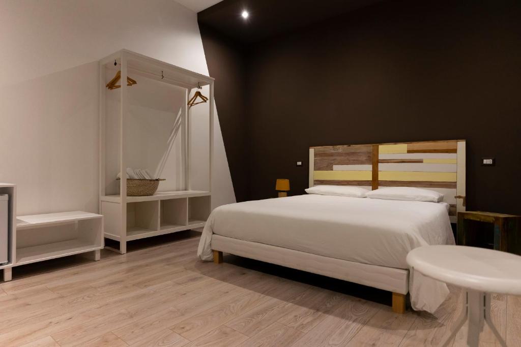 Posteľ alebo postele v izbe v ubytovaní Adrian's B&B
