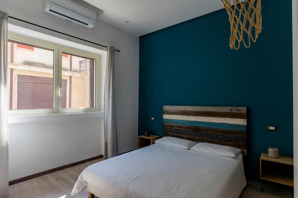 Posteľ alebo postele v izbe v ubytovaní Adrian's B&B