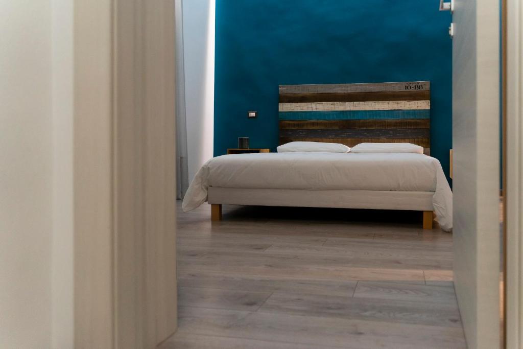 Posteľ alebo postele v izbe v ubytovaní Adrian's B&B