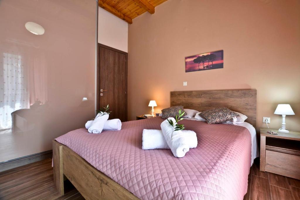 Postel nebo postele na pokoji v ubytování Sia's Holiday Home