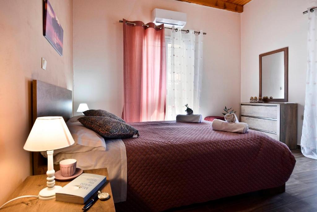 Postel nebo postele na pokoji v ubytování Sia's Holiday Home
