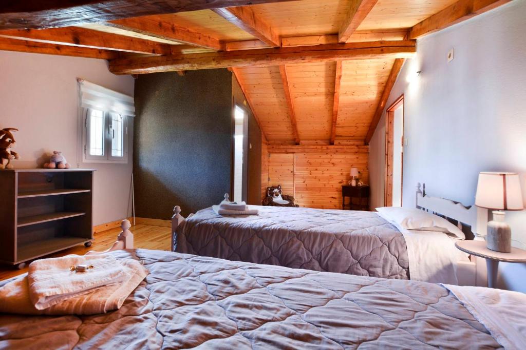Postel nebo postele na pokoji v ubytování Sia's Holiday Home